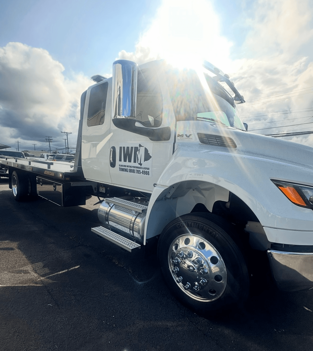 Island Wide Motors flatbed tow truck ready to serve Hawaii Island